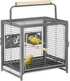 Black wrought iron bird travel carrier with wire sides, stacked interior, and top handle