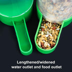 Close-up of green outlet and feeder chute for seed and water dispenser set