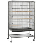 Gray wire birdcage with two interior perches and hinged door, on casters