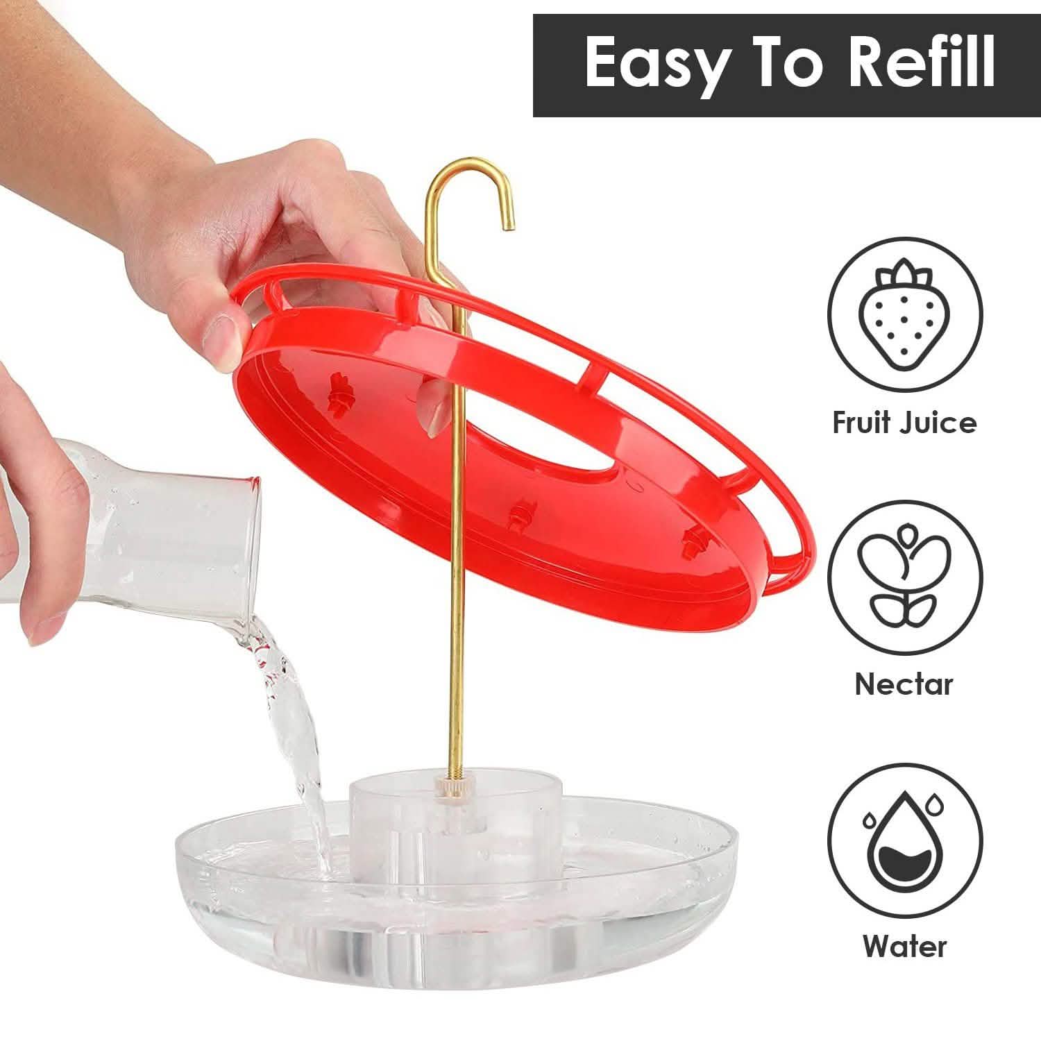 Red hummingbird feeder with hanging hook and refill-ready clear base, nectar pour