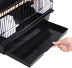 Black slide-out tray bottom for large bird cage; hand pulling out the tray