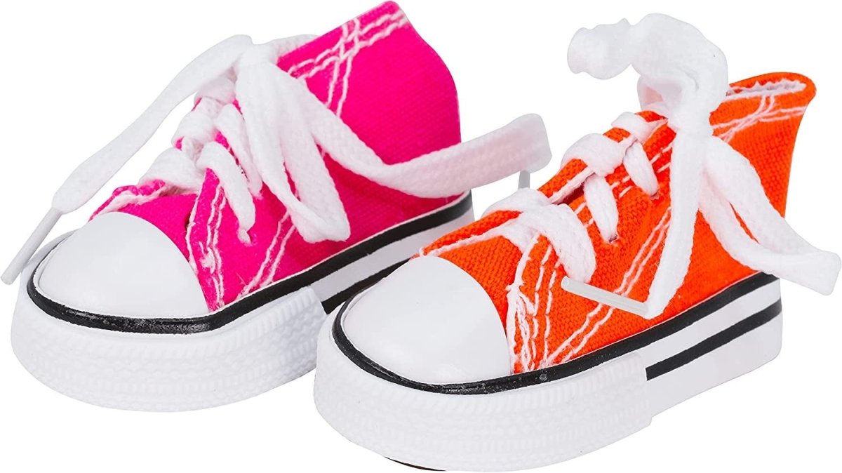 Pair of mini sneakers toy with white laces in hot pink and orange