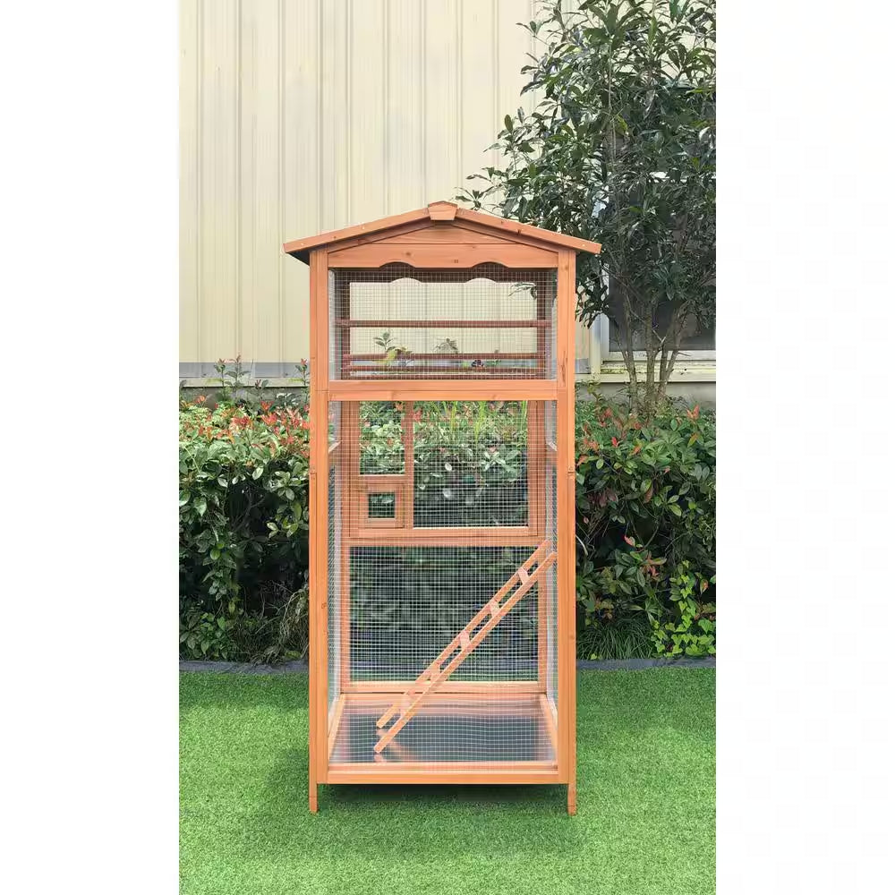Wood bird aviary with wire mesh panels, arched roof, and slide-out tray