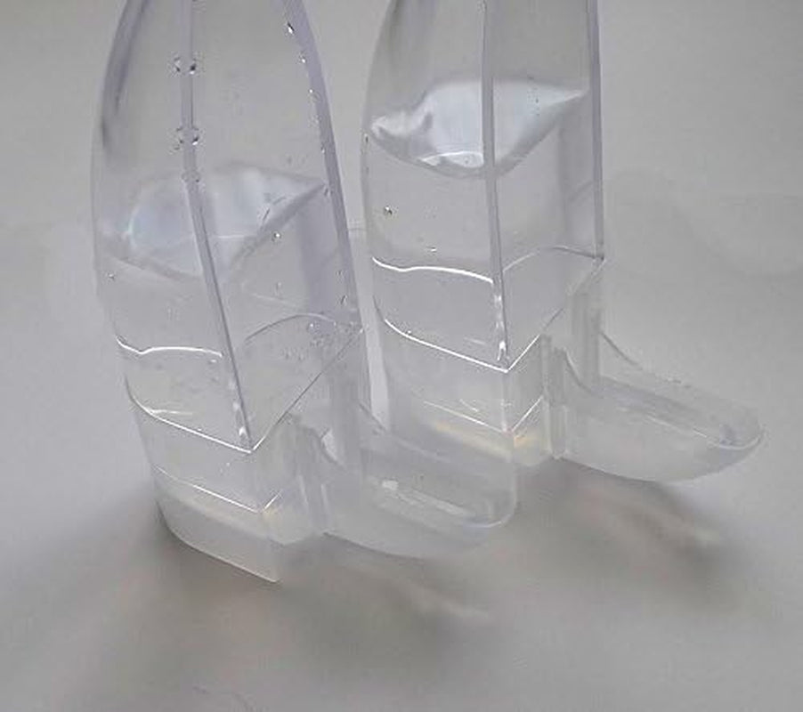 Clear hanging water dispenser and feeder bottles, close-up view of two