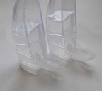 Clear hanging water dispenser and feeder bottles, close-up view of two