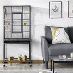 Rolling metal bird cage with removable stand and multiple interior perches.