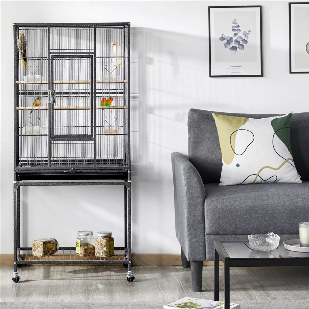Rolling metal bird cage with removable stand and multiple interior perches.