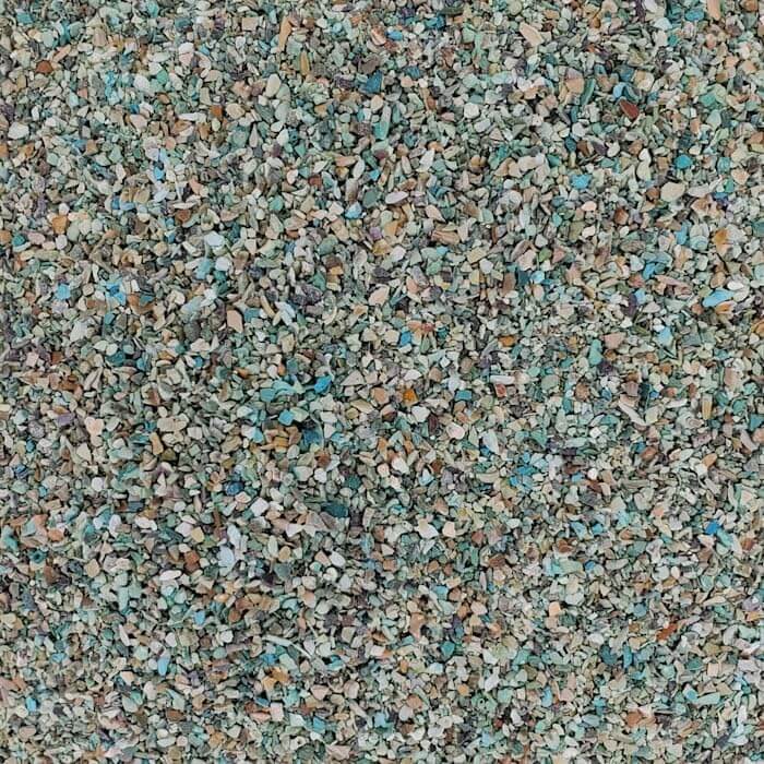 Mineral grit granules from crushed oyster shells, speckled light blue and beige