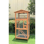 Wood bird aviary with wire mesh door panels and slanted lower support bars