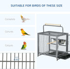 Black wrought iron bird travel carrier with wire bars and food bowl for small birds