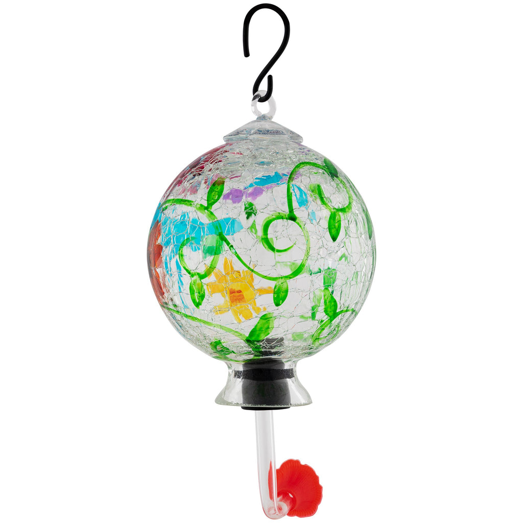 Hanging hand-painted glass hummingbird feeder with green vines and orange-red flower