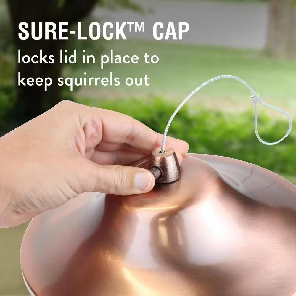 Copper bird feeder lid cap detail with lock mechanism and hanging hook