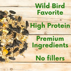 Assorted bird seed grains on wood with colorful bird and text-free ingredient focus
