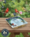 Blue suet cake tray labeled Fancy Blend for wild songbirds