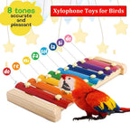 Colorful wooden xylophone toy with hanging chains and multicolor keys, with parrot
