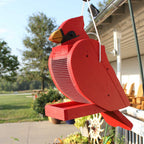Red and black wooden hanging wild bird feeder with mesh body and songbird shape