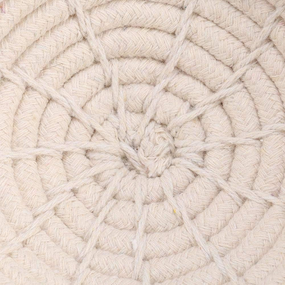 Beige hand-woven rope nest bed with circular braided pattern