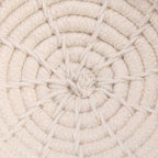 Beige hand-woven rope nest bed with circular braided pattern
