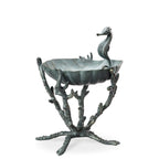 Seahorse-themed birdbath with scalloped metal basin and three-legged stand