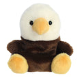 Brown-and-white bald eagle plush with orange beak and yellow feet