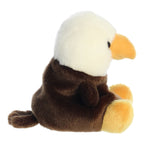 Brown-and-white bald eagle plush sitting, orange beak and yellow feet